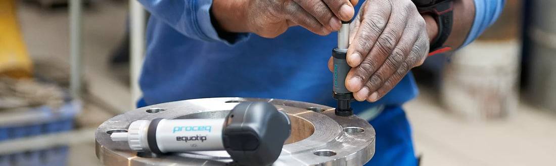 Man Woring On Stainless Steel Flanges